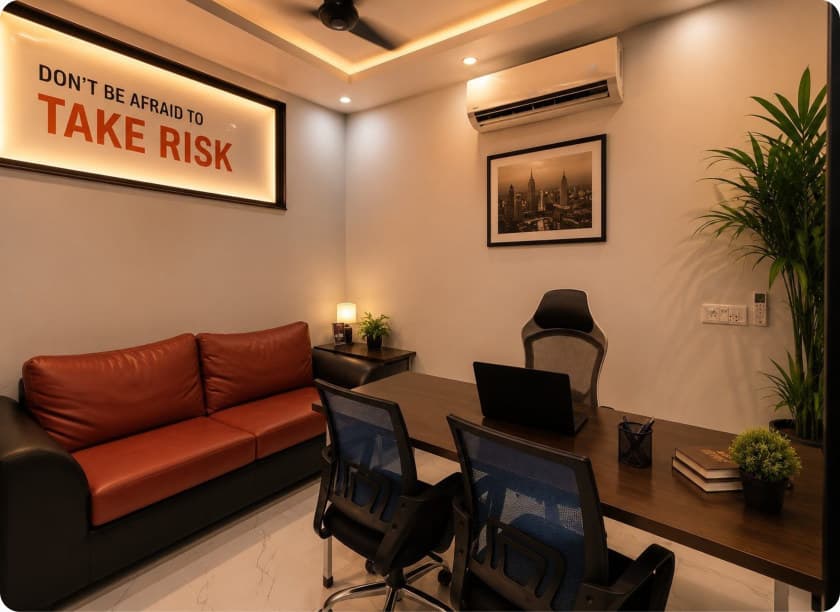 A private office at Co-Remotely with a sofa and a “don’t be afraid to take risk” sign